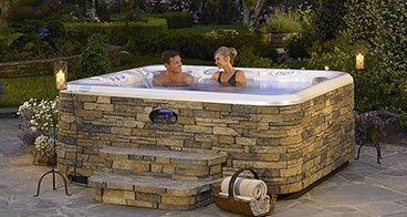 couple in regular hot tub